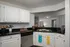 Kitchen with stainless steel appliances.