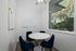 Study room with four chairs and a white board