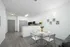 Dining room with breakfast bar and kitchen