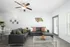 Living room area with large window and door out to balcony