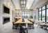Clubhouse table with tv, coffee bar and fireplace