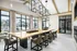 Clubhouse table with tv, coffee bar and fireplace