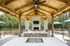 Lanai with table, fireplace, and tv