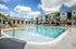 Pool with buildings in background