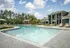Pool with clubhouse in background