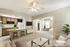 Living room, kitchen and bedroom in the background