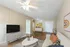 Living room, kitchen and bedroom in the background