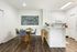 Kitchen with quartz countertops and dining area