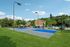 Basketball court with buildings in background
