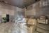 Luxurious private theater room with plush leather recliners and modern decor for an extraordinary cinematic experience.