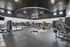 Spacious and modern fitness center with state-of-the-art gym equipment and sleek design.