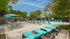 Pool area with lounge chairs