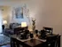 Inviting well lighted living and dining area.