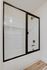 Modern bathroom featuring a sleek glass shower enclosure, elegant chrome fixtures, and a stylish wooden floor.