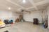 Spacious modern garage with ample storage, ideal for organization and functionality.