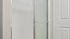 Modern shower enclosure with sleek chrome accents and frosted glass door, perfect for a stylish bathroom design.