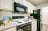 Stove and Microwave In Kitchen