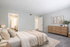 Inviting bedroom with cozy neutral tones, featuring ample natural light, a plush bed, modern wooden dresser, and elegant decor. Perfect for relaxation and comfort.