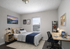 Inviting bedroom with cozy bed, sunlit window, and modern desk setup, perfect for relaxation and productivity.