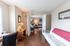 Residents Lounging in the Living Room | Buffalo NY Apartments For Rent | Windsong Place Apartments