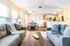 Carpet in the Living Room and Wood-Style Plank Flooring in the Dining/Kitchen Area | Buffalo NY Apartmens | Windsong Place