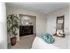 Master Bedroom Suite with a Reading Nook at Apartment Home Rentals in Williamsville | StoneGate Apartment Homes