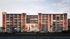 Charming red-brick apartment complex with large windows, offering a blend of classic architecture and modern amenities.