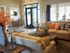 Office waiting room with two couches and coffee table