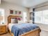 Master Bedroom with queen bed, 2 nightstands and 3 windows