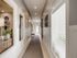 Amenity hallway with bench