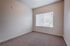 Guest bedroom with large window