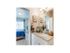 Master bathroom with white cabinets and silver hardware