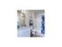 Master bathroom with larger vanity with white cabinets, toilet, and tub/shower combo