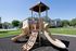 Smaller playground with 3 slides and climbing structure