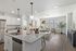 Open concept kitchen and dining room, furnished with modern fixtures, stainless steel appliances and luxury vinyl plank flooring. white and grey finishes
