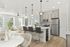 Two-Bedroom Apartments in Billings, Montana - Hunter's Pointe - Kitchen Featuring Island With Seating, Stainless-Steel Appliances, Pantry, and Light Fixtures