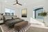 Billings, Montana Studios For Rent - Hunter's Pointe - Bedroom Featuring Ceiling Fan, Large Windows, Large Bed, and Chic Furniture
