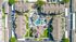Bird's-eye view of a luxurious apartment complex featuring a resort-style swimming pool, landscaped gardens, and ample parking.
