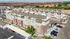 Charming apartment complex with modern design and ample parking, set against a breathtaking canyon backdrop.