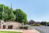Charming Hunter&rsquo;s Pointe entrance with stone accents, surrounded by lush greenery and a welcoming community feel.