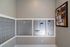 Secure and convenient mailroom with individual mailboxes and community notice board.