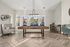 Apartments in Ogden, UT, with In-Unit Washer and Dryer - Pinebrook Apartments - Game Room With Pool Table, Lounge Seating, Large Windows, Herringbone Flooring, And Modern Globe Chandelier.