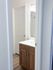 Updated bathrooms showcase modern cabinetry, stylish fixtures, and clean contemporary finishes.
