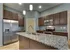 Granite Counters and Corner Pantry