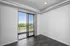 Bright apartment with modern open layout, featuring floor-to-ceiling windows and stunning balcony views.
