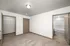 Bright, spacious bedroom featuring plush carpet, a roomy closet, and an attached bathroom with modern fixtures.