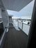 Charming balcony view showcasing a snowy landscape, perfect for cozy winter evenings.