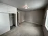 Spacious bedroom with plush carpeting, large closet, and ample natural light.