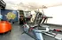 Modern fitness center featuring state-of-the-art exercise equipment, inspiring decor, and a welcoming atmosphere.