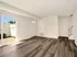 Updated Living Area with Vinyl Plank Floors and Private, fenced-in patio